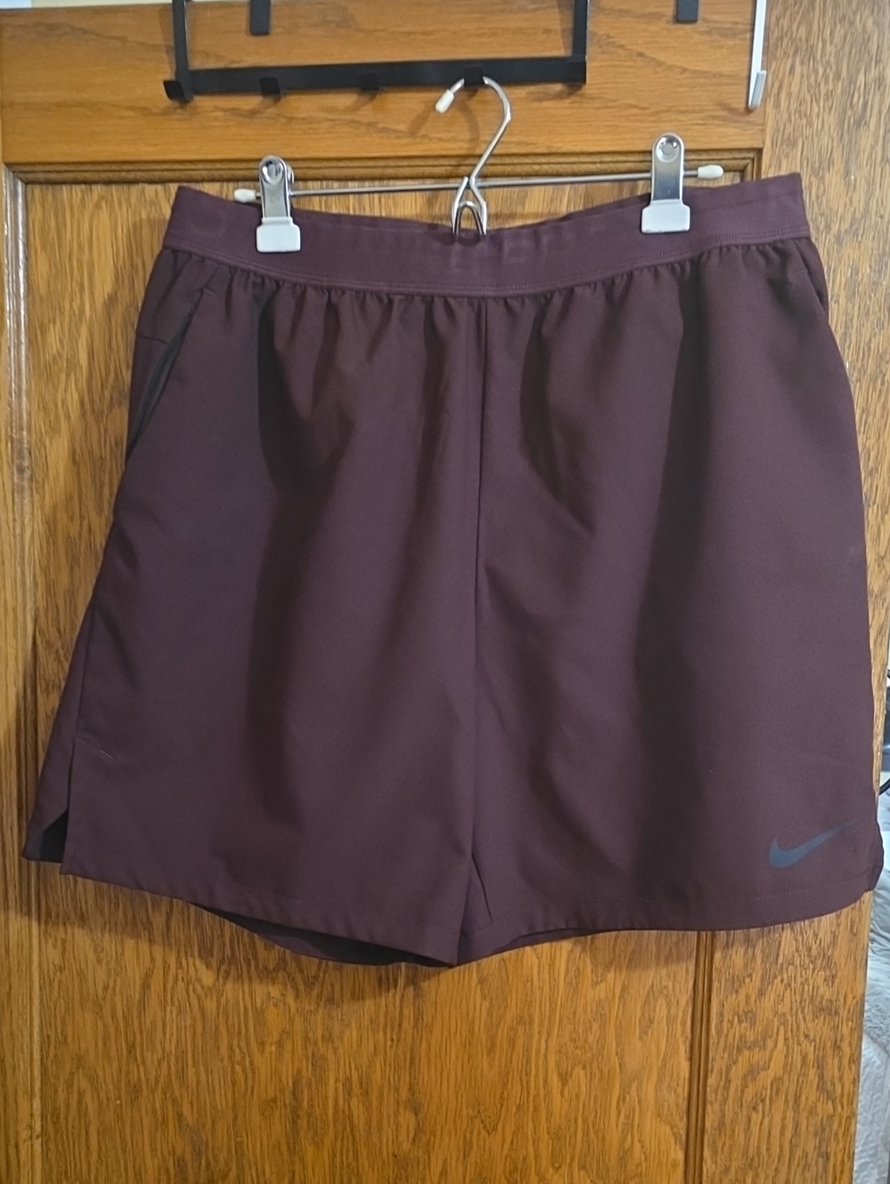 Nike Women's Maroon Athletic Shorts with Subtle Swoosh